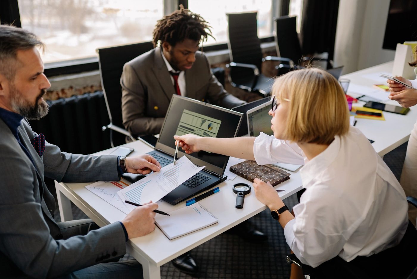 Fountain team members in a client meeting, discussing a project together